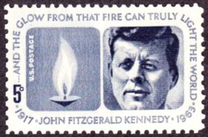 John F. Kennedy auf Briefmarke von Raymond Loew 1964